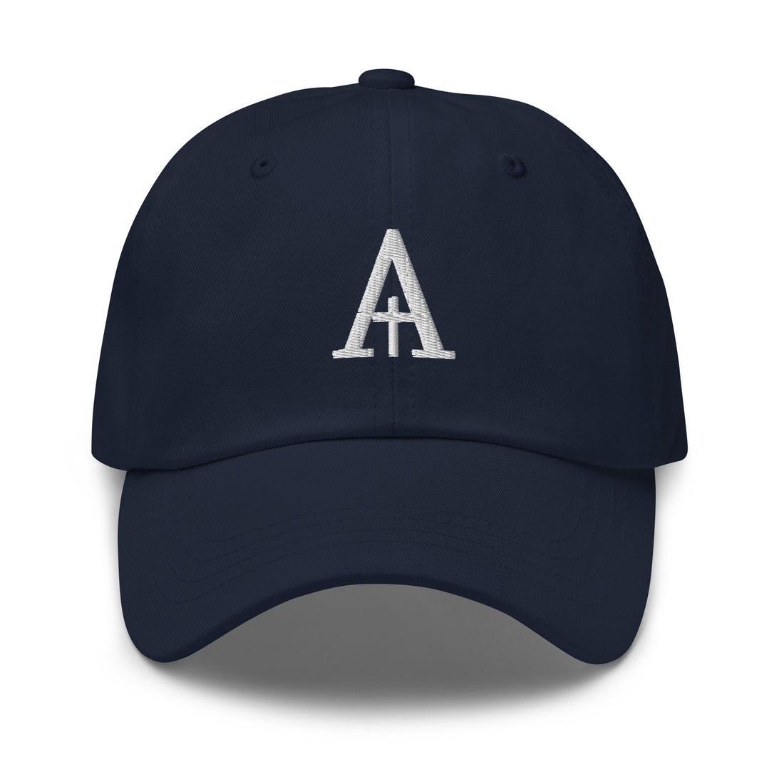 Averan Monogram Cap in navy — front view showing the embroidered ivory monogram