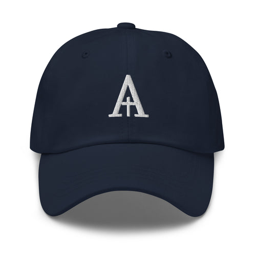 Averan Monogram Cap in navy — front view showing the embroidered ivory monogram